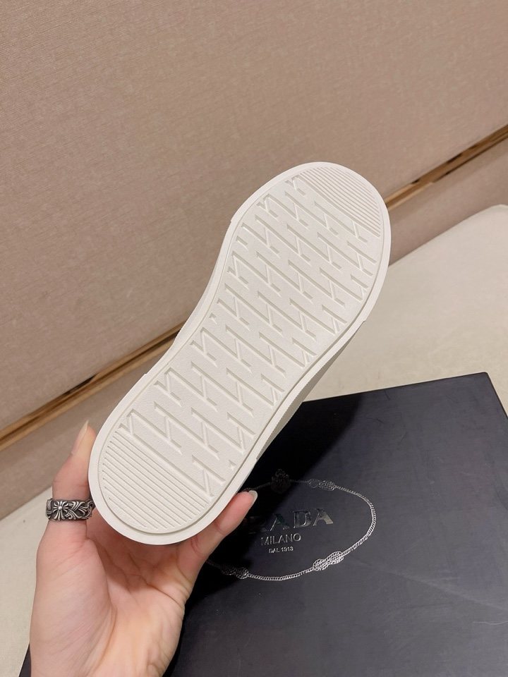 Prada Triangle-Patch Slip-On Shoes